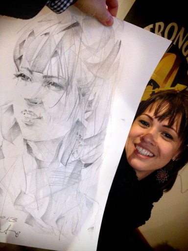 Ana e seu retrato em grafite, feito por um artista polonês